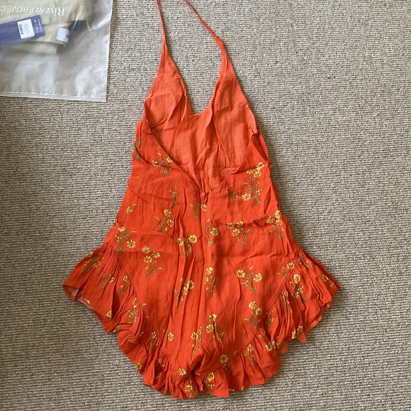 Backless romper. - Picture 2 of 3